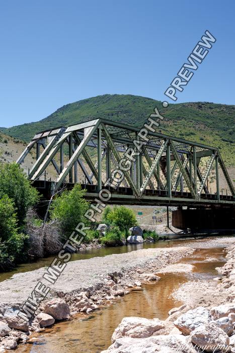 Protected preview of Steel Bridge Above a Rocky Stream, an original Mike Mester photograph